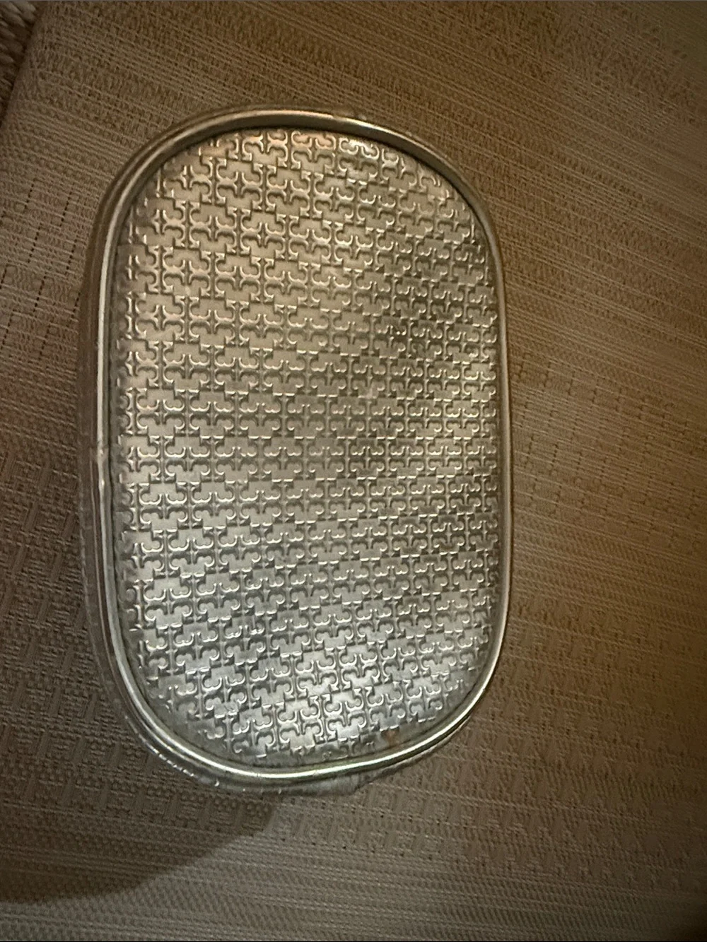 Tory Burch Silver Embossed Oval Cosmetic Case